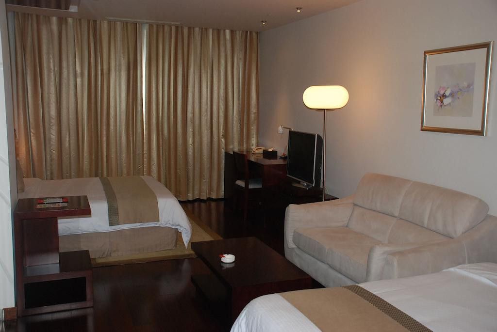 Ramada Plaza Shanghai Gateway Rum bild